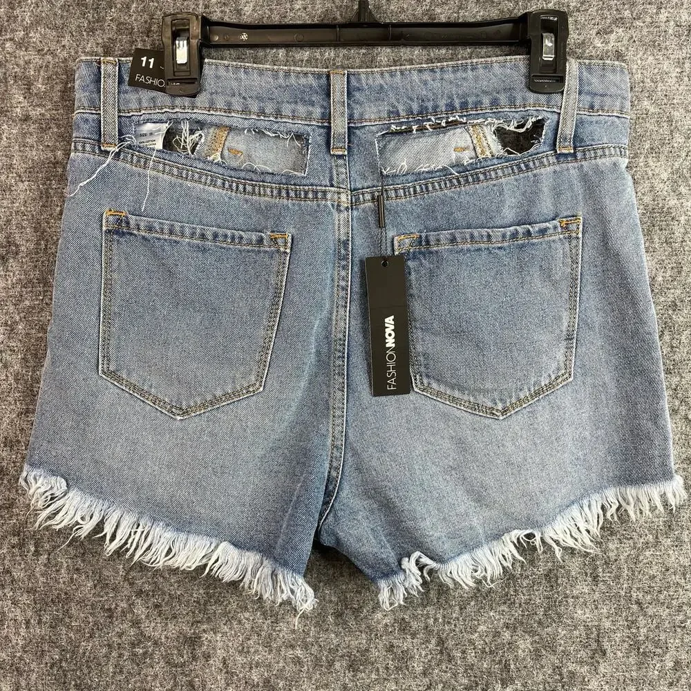 FashionNova Light Blue Wash Distressed Shorts Size 11